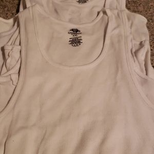 6 White tank tops